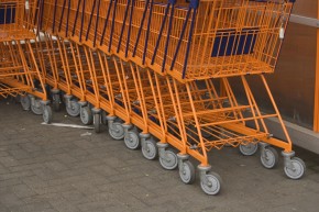 Close-up of a row of shopping carts