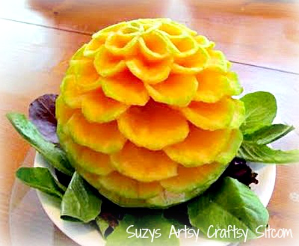 carving flower from cantaloupe