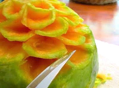 carving flower from cantaloupe