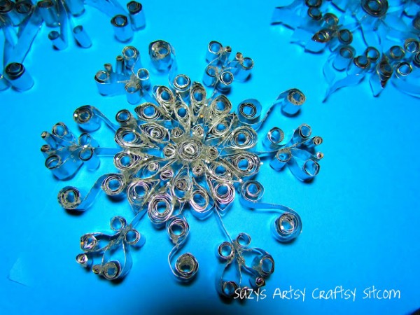 quilled aluminum snowflakes made from disposable cookie sheets